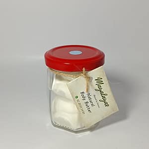 Natural body butter in jar with shea butter and essential oils